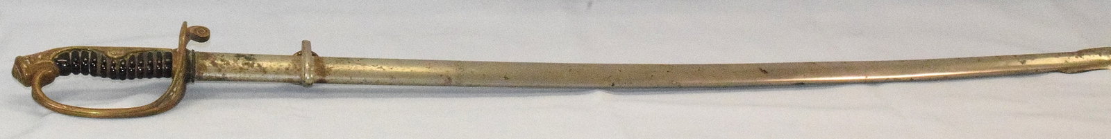 WWII JAPANESE OFFICERS DRESS SWORD: WWII Japanese officers sword. 35 inches long. Some surface rust. Some minor pitting on blade.