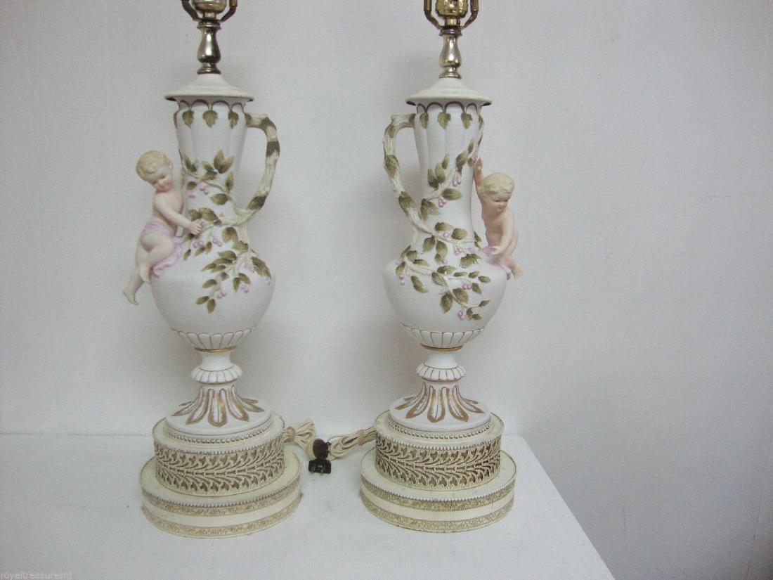 Cherub Floral Handle Hand Painted TABLE LAMP: White Cherub Floral Handle Hand Painted Porcelain or Ceramic Table Lamp 34"H, Beautiful Cherub and Floral Handle Hand Painted Porcelain or Ceramic Table LampMetal base,It is in very good condition, Am