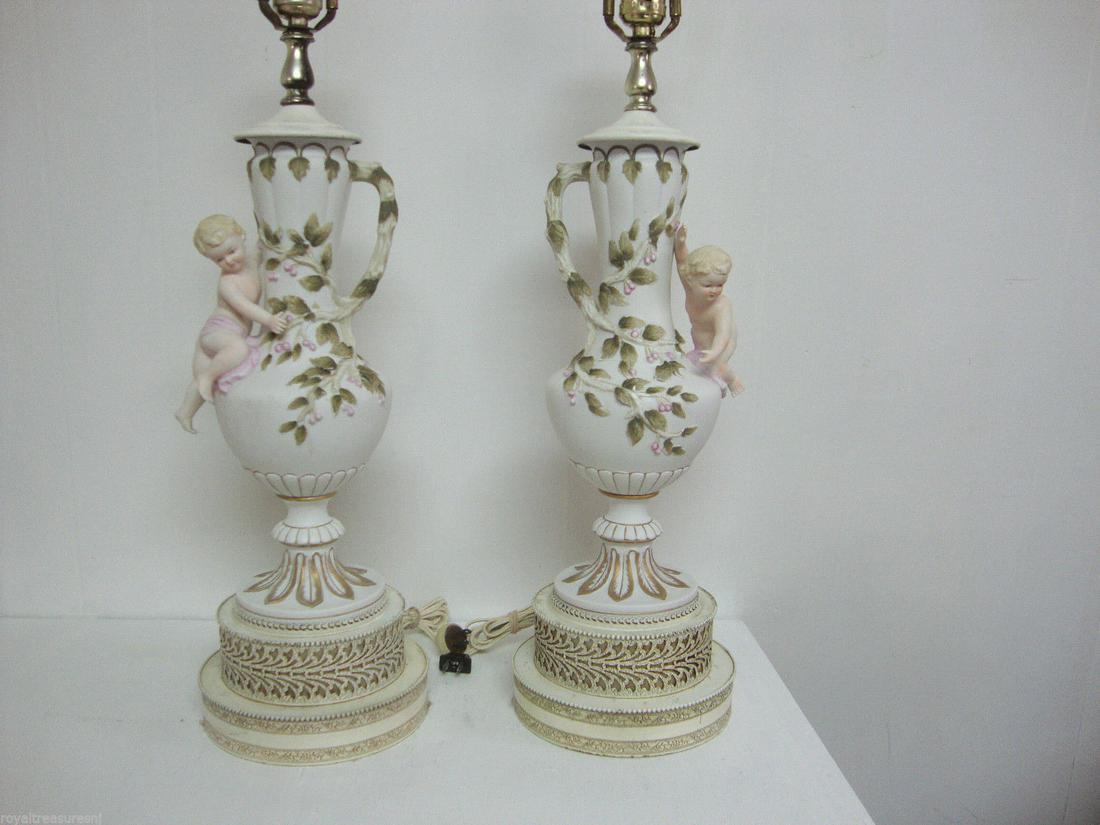 Cherub Floral Handle Hand Painted TABLE LAMP: White Cherub Floral Handle Hand Painted Porcelain or Ceramic Table Lamp 34"H, Beautiful Cherub and Floral Handle Hand Painted Porcelain or Ceramic Table LampMetal base,It is in very good condition, Am