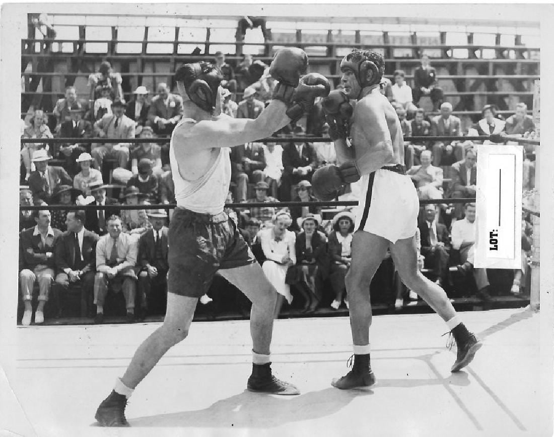 1935 Max Baer Sparring For JAMES J. Braddock Photograph: B&W Max Baer Sparring For JAMES J. Braddock- Photography. Print Size: 8 x 10 Inches.May have Wrinkling-edge wear-stains-creases Ã‚Â—- See photos for condition, Due to the difference in monitor s