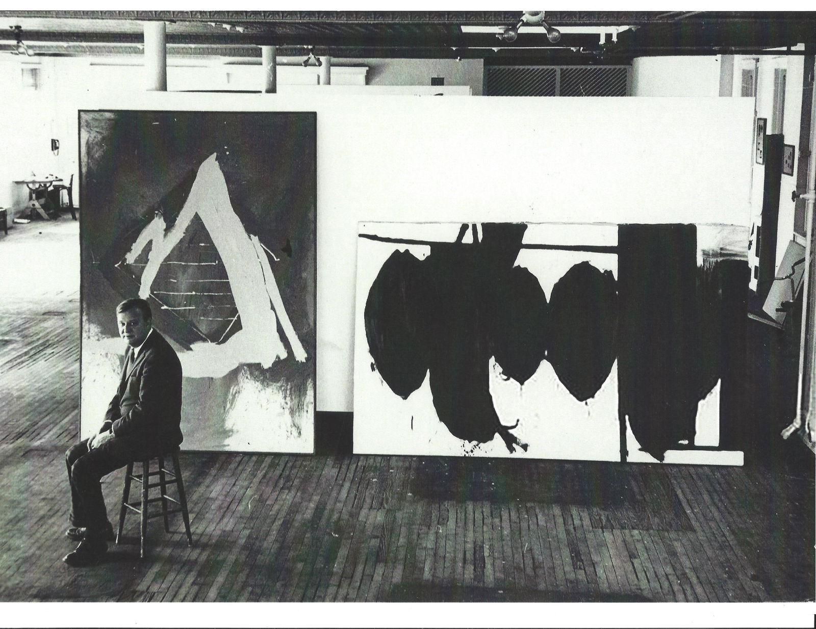 American Artist Robert Motherwell Poses In His Loft 1962: American Artist Robert Motherwell Poses In His Loft 1962 Print Photography. Approx Size: 11 3/4 x 8 1/4 inches . Provenance: New York-Based Photography Collector & Curator - Collection Vintage and Rar