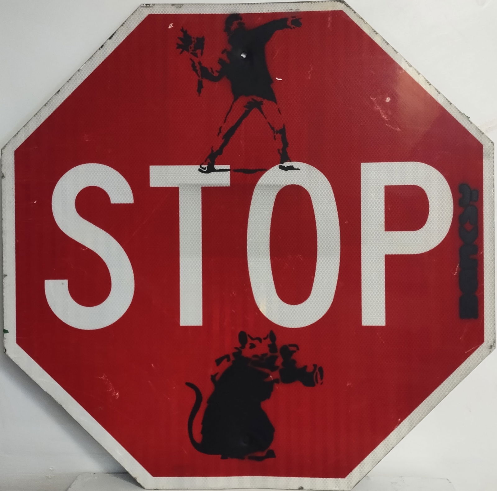 Original Detroit,Michigan Banksy's -Flower Thrower - Camera Rat - Street Stop Sign Painting.: Original Detroit,Michigan Banksy's -Flower Thrower - Camera Rat - Street Stop Sign Painting.Aluminum sign. Measures:30 x 30 inches. The sign shows of wear from being outside. The painting itself has b