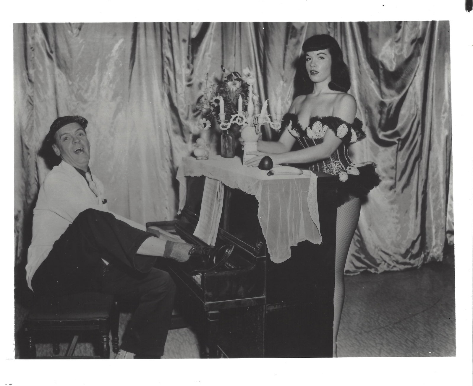 Vintage Bettie Page Back & White Photography Piano Lingerie: Vintage Bettie Page Back & White Photo Lingerie Provenance: New York-Based Photography Collector & Curator -Collection of Rare Photographs. Approx Size: 8 x 10 inches. Photo may have bent corners, dam
