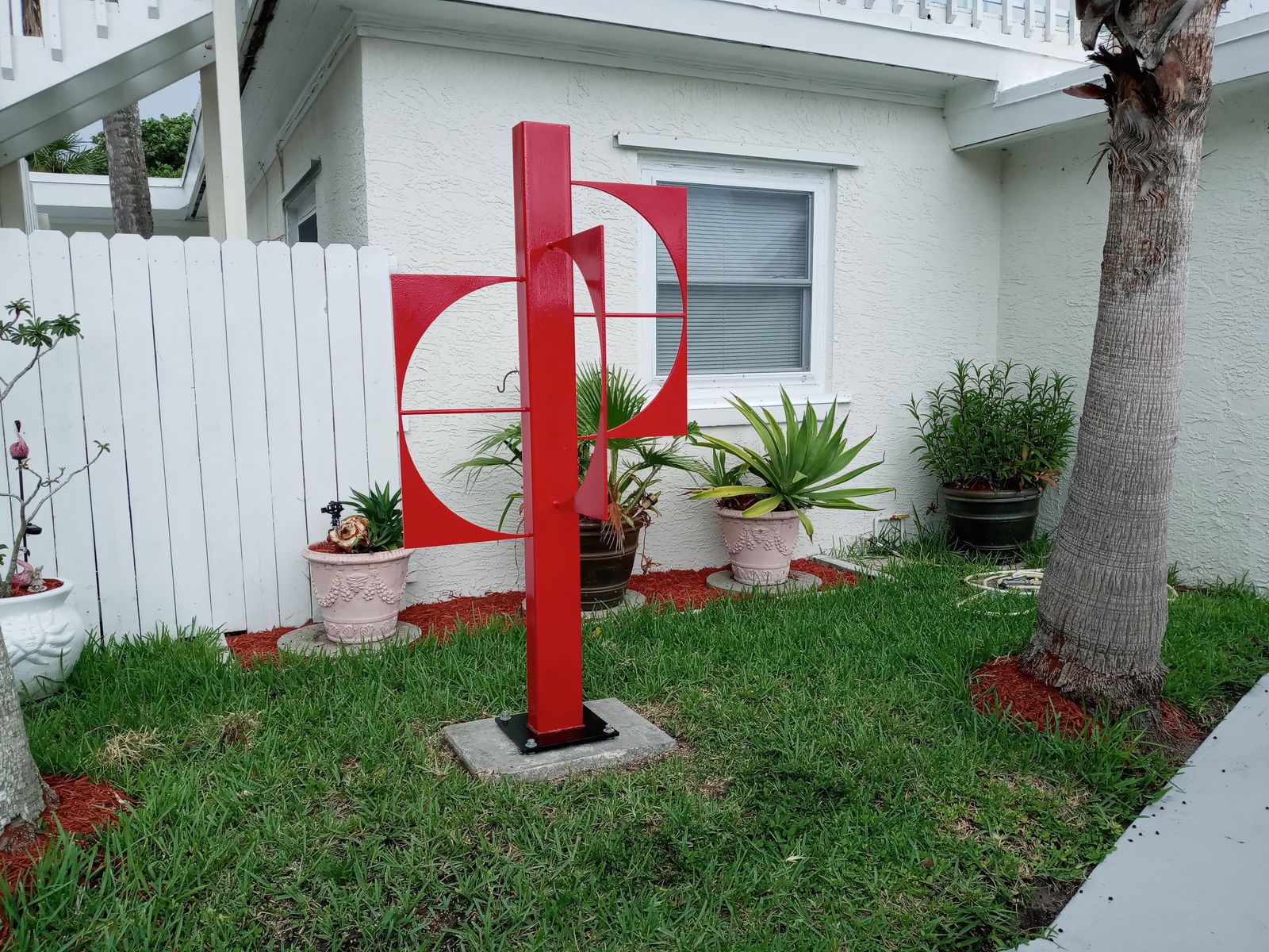 OUTDOOR INDUSTRIAL STEEL METAL SCULPTURE MODERN CONTEMPORARY LAWN GARDEN: OUTDOOR INDUSTRIAL STEEL METAL SCULPTURE MODERN CONTEMPORARY LAWN GARDEN. Approximate DIMENSIONS: H-72 1/2 x W-37 1/2 x 19 inches. Plate:12 x 12 x 1/2Inches. 5/8 Base HoleIs around 150 Lbs. .DESCRIPTI