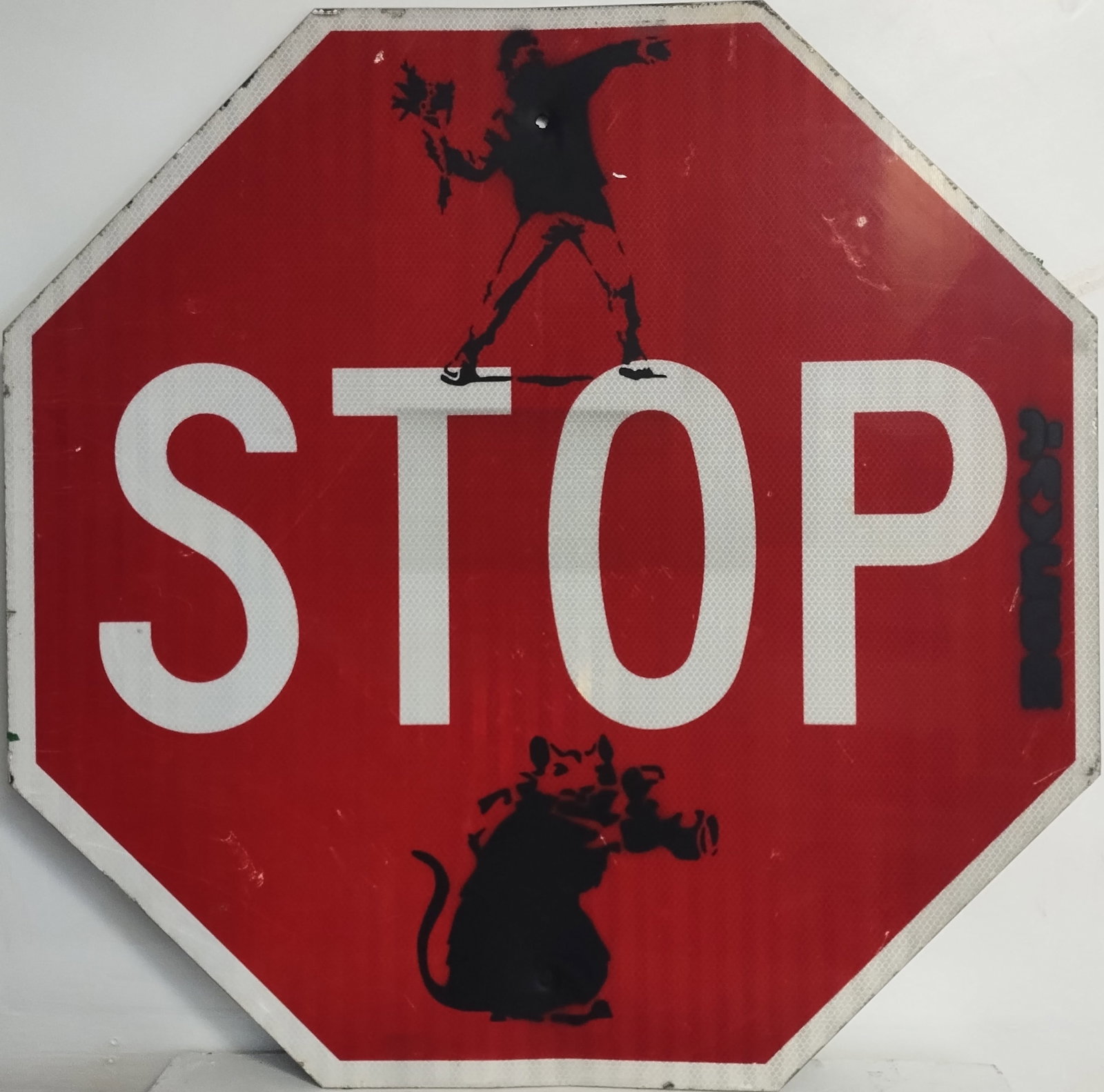 Original Detroit,Michigan Banksy's -Flower Thrower - Camera Rat - Street Stop Sign Painting.: Original Detroit,Michigan Banksy's -Flower Thrower - Camera Rat - Street Stop Sign Painting.Aluminum sign. Measures:30 x 30 inches. The sign shows of wear from being outside. The painting itself has b