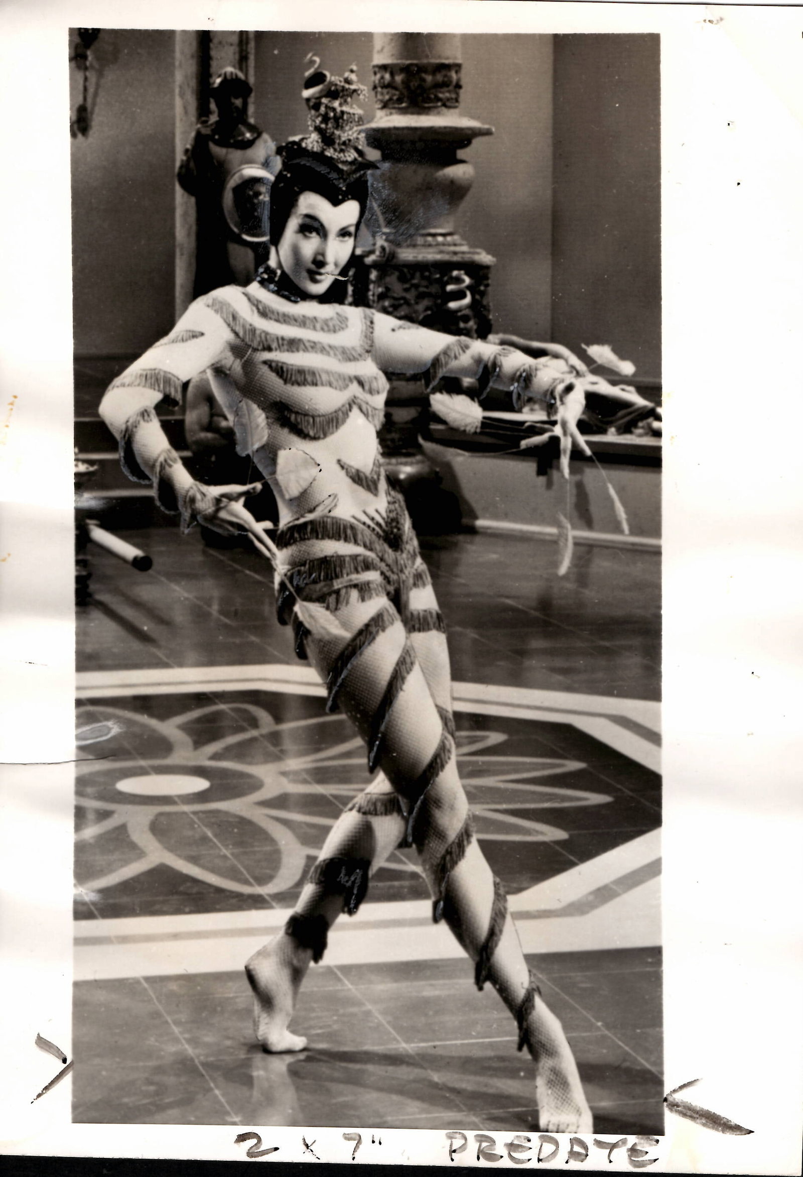 1956 Photography, Actress Sylvia Lewis Dances In Exotic Costume: 1956 Photography, Actress Sylvia Lewis Dances In Exotic Costume In The Conqueror Approx Photography Size: 9 x 6 1/2 inches.Provenance: New York-Based Photography Collector & Curator . Collection of Hi