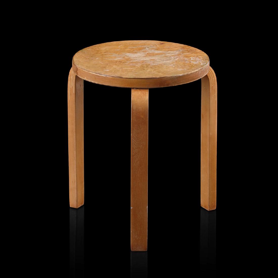 Alvar Aalto: Very rare three foot stool 30/40Â´s karelian birch by Alvar AaltoCarelian birchHeight: 44cm