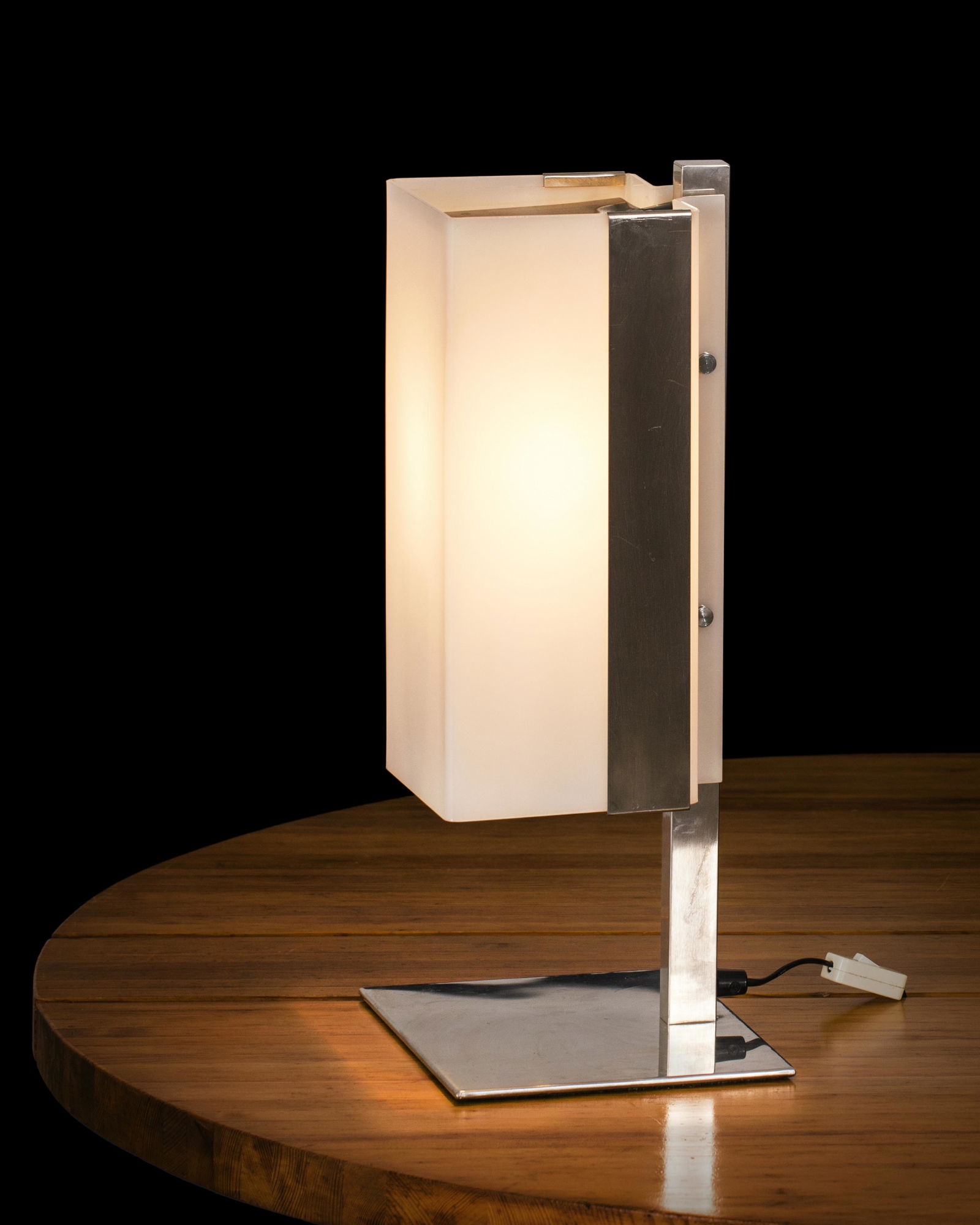 Lars-Gunnar NordstrÃ¶m: A table lamp for the hotel Esperia in Helsinki, around 1960, designed by Lars-Gunnar NordstrÃ¶m, signed "Metallimestarit Oy". Plastic, chrome, plated metal. Height 52cm