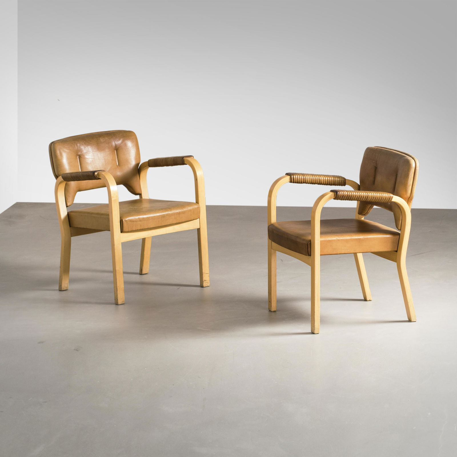 Maija Heikinheimo: A pair of "43" armchairs, model from mid XX century, designed by Maija Heikinheimo for Artek. Birch, leather. Height 74cm, width 62cm, depth 54cm, seat height 43 cm
