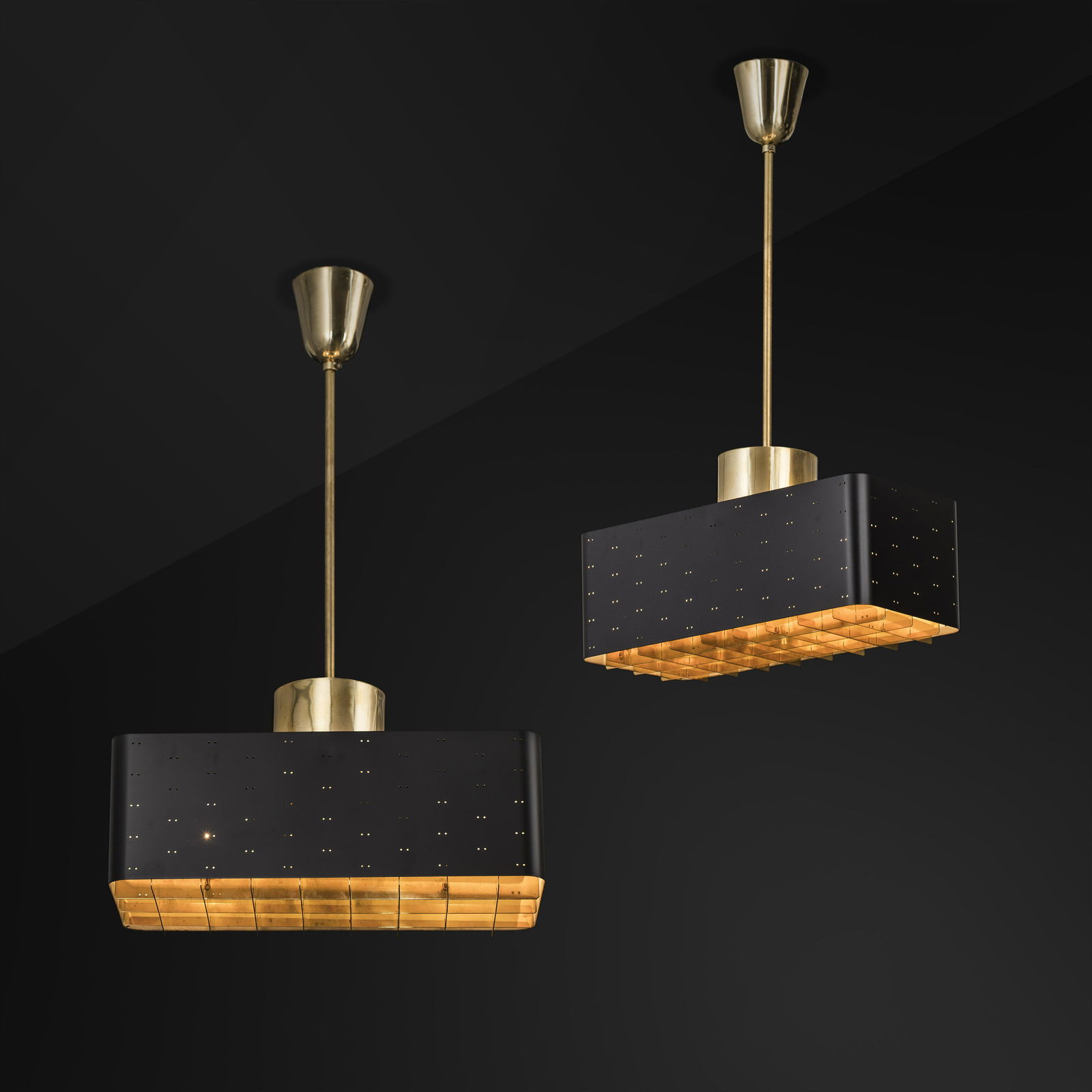 Paavo Tynell: A pair of ”Starry sky” ceiling lights designed by Paavo Tynell for Idman.. 20x20cm, height: 67cm. Signed -