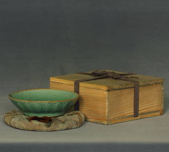 A LongQuan-Kiln bowl Southern Song Dynasty.: A LongQuan-Kiln bowl Southern Song Dynasty,with Japanese wood box and bag. Measure(inch), Height: 1-3/8, Diameter: 5-1/4. Provenance: Collectible of Japanese tea ceremony clan.