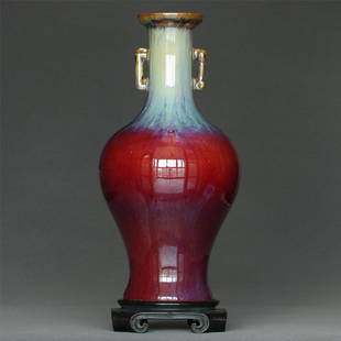 Red glaze discoloration porcelain vase of Qing Dynasty: Red glaze discoloration porcelain vase of Qing Dynasty YongZheng mark. With base. Vase Measure(inch), Height: 10-3/4 , Diameter: 5-3/8. Provenance: Collectible of Japanese tea ceremony clan.