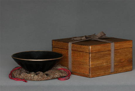 A JiZhou-Kiln 'Tree Leaf 'Bowl Southern Song Dynasty.: A JiZhou-Kiln 'Tree Leaf 'Bowl Southern Song Dynasty.The rim mounted in metal. With Japanese wood box and bag. Bowl Measure(inch), Height: 2-1/4 , Diameter: 6. Provenance: Collectible of Japanese tea