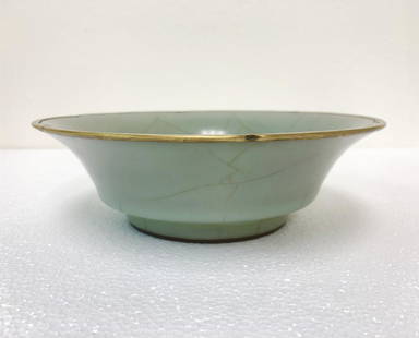 A Guan-Kiln bowl Southern Song Dynasty.: A Guan-Kiln bowl Southern Song Dynasty.The rim mounted in metal. Measure(inch), Height:2-1/4 , Diameter: 7-3/8 . Provenance: Collectible of Japanese tea ceremony clan.
