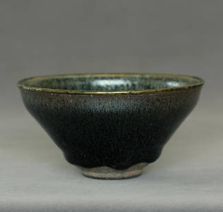 A 'Jian' 'Hare's fur' 'TENMOKU' Bowl Southern Song: A 'Jian' 'Hare's fur' 'TENMOKU' Bowl Southern Song Dynasty. The rim mounted in metal. With Japanese wood box and bag. Bowl Measure(inch), Height: 2-1/2 , Diameter: 4-7/8. Provenance: Collectible of Ja