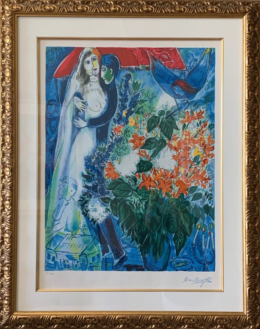 Marc Chagall (After) - The Wedding: ARTIST: Marc Chagall (After) TITLE: The Wedding MEDIUM: Lithograph FRAME SIZE: 39 x 31.5 in EDITION: 950 DESCRIPTION: Limited edition lithograph print after Marc Chagall. A lovely decorative print wit