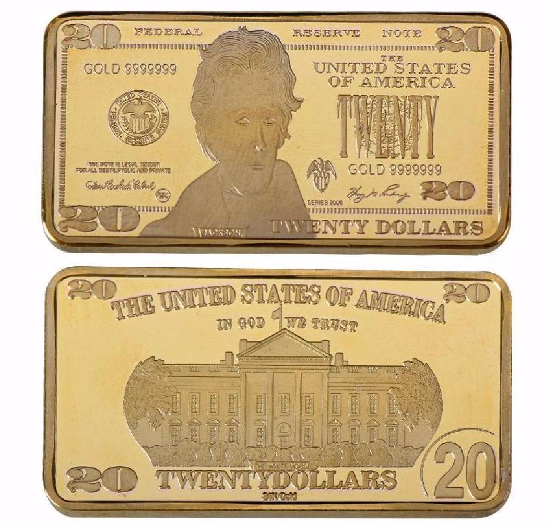 USA $20 24K Gold Clad Bullion Bar: Unites States of America 20 Dollars 24K Gold Clad Bullion Bar. Unique design. Non-currency bar. Size: 5cmx2.8cm. Weight ? 32 grams.