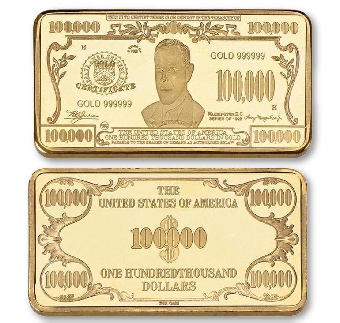 USA $100,000 24K Gold Clad Bar: Unites States of America 100,000 Dollars 24K Gold Clad Bar. Unique design. Non-currency bar. Size: 5cmx2.8cm. Weight ? 32 grams.