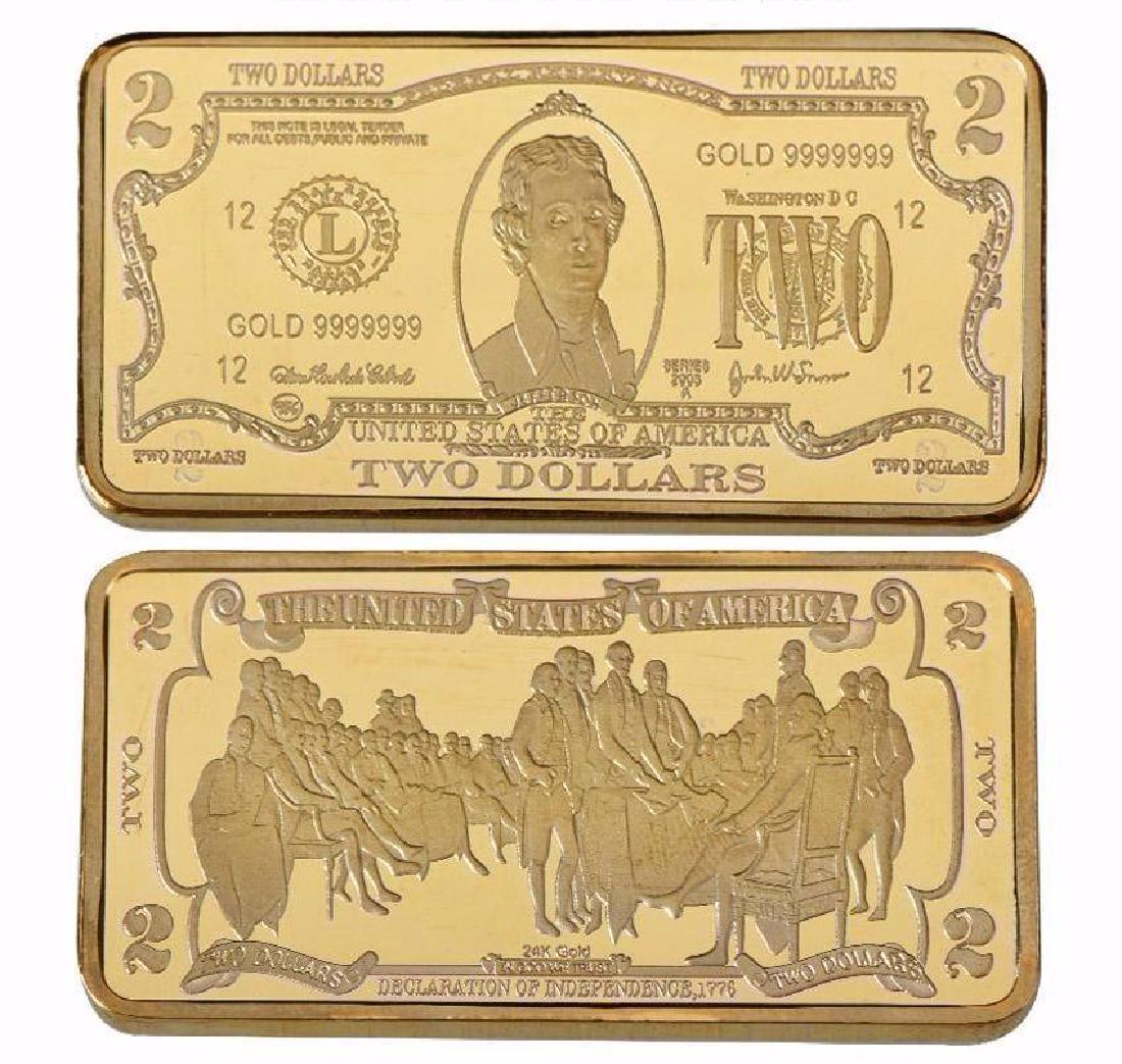 USA $2 24K Gold Clad Bar: Unites States of America 2 Dollars 24K Gold Clad Bar. Unique design. Non-currency bar. Size: 5cmx2.8cm. Weight ? 32 grams.
