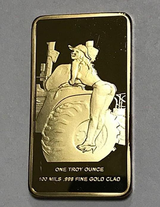 Woman on Tractor Gold Clad Bar: Size: 50mm x 28mm. Weight: about 28g