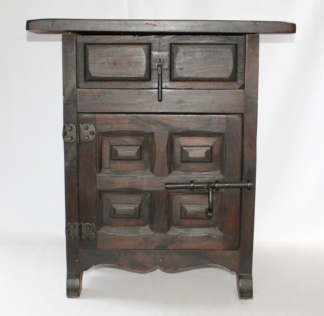 Small Hand Carved Antique Spanish Night Stand: Small antique Spanish nightstand hand carved in very good condition. Measures 22" w x 23.5" h x 12.25" d and weighs approximately 31 lbs.