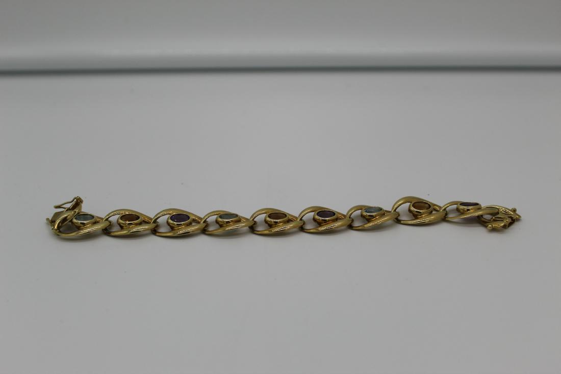 14 Kt. Gold bracelet w/ semi precious stones (1 of 7)