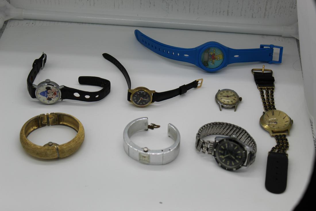 Lot 8 watches/ watch parts varying in different (1 of 12)