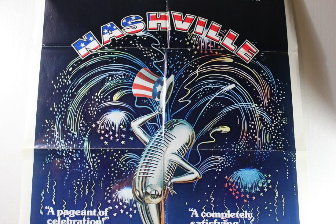 Nashville (1975) American Broadcast Companies (Paramont: Original poster from the 1975 film â€œNashville”. The poster is dark blue and black with a microphone in the middle tipping its hat and fireworks behind it. *All posters shipped f