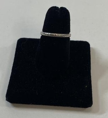 1927 Platinum Wedding Ring: Platinum Wedding Ring, The engraving on the inside of the P.D.R to M.A.D 6.5.27. The ring size is 6.25 and is 2.6 grams.