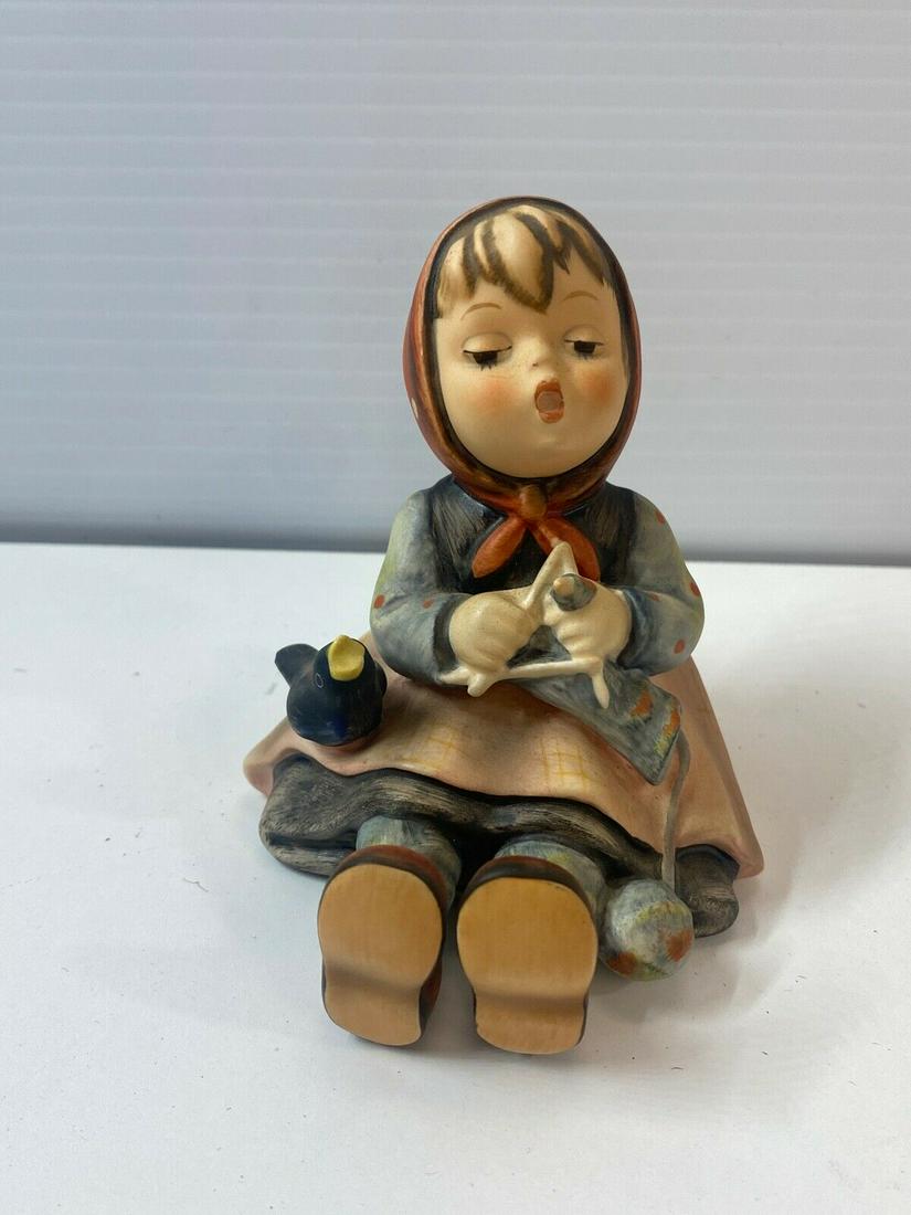Vintage Hummel Goebel Happy Pastime Girl Knitting Figurine No. 69: Vintage Hummel Goebel Happy Pastime Girl Knitting Figurine No. 69. it is in good condition, it measures 2 1/2" x 2 1/4" x 3 1/4". it was retired in December 1996 .