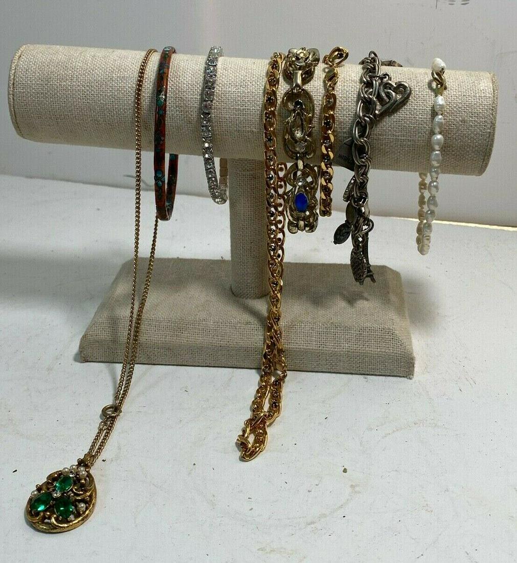 8 - Costume Jewelry Necklaces & Bracelets: 8 - Costume Jewelry Necklaces & Bracelets. this is a nice to of costume jewelry, there are two gold told necklaces in this lot they measure 14" and the bracelets measures 6" , 3" closed.