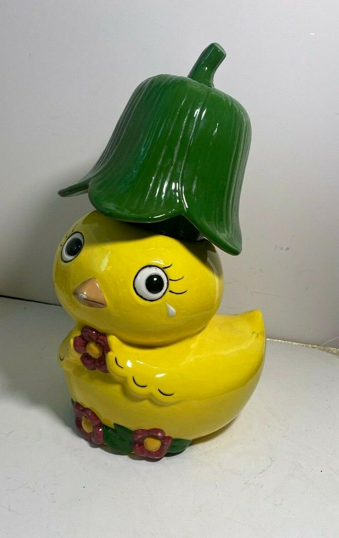 Vintage Tulip Chick Cookie Jar: Vintage Tulip Chick Cookie Jar. It is in good condition, it has signs offer and is chips on the tip of the beak and at the base on the top and on the inside and the beak.they measures 7" x 6" x 13", T