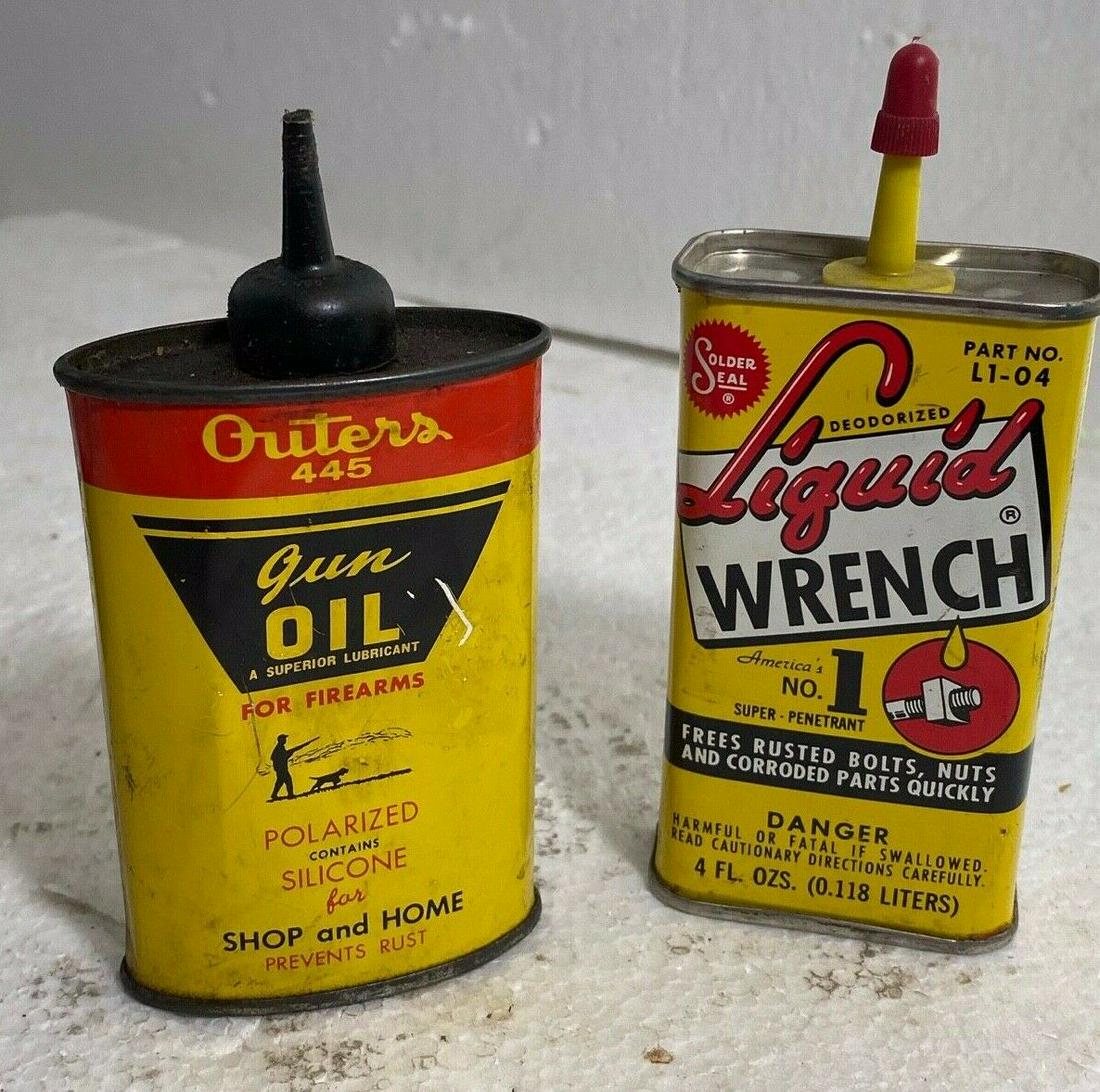 2 - Outers 445 Gun Oil & Liquid Wrench Empty Oil Tin Advertisements: 2 Tin Oil Cans, the first one is a - Outers 445 Gun Oil for Firearms & Liquid Wrench L1-04. they are both Empty Oil Tins. they are in good condition for their age, the first measures 2 1/2" x 1" x 5"a