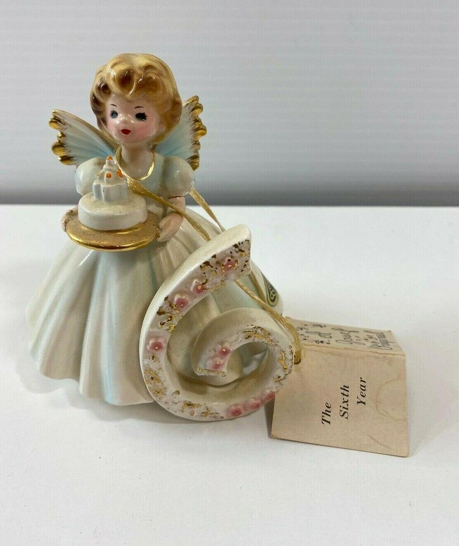VTG A Josef Original Birthday Angel The Sixth Year: Vintage A Josef Original Birthday Angel The Sixth Year. its a birthday Angel holding a birthday cake with a giant 6 in the front. It is in good condition, it does need to be cleaned. it measures 4" x 