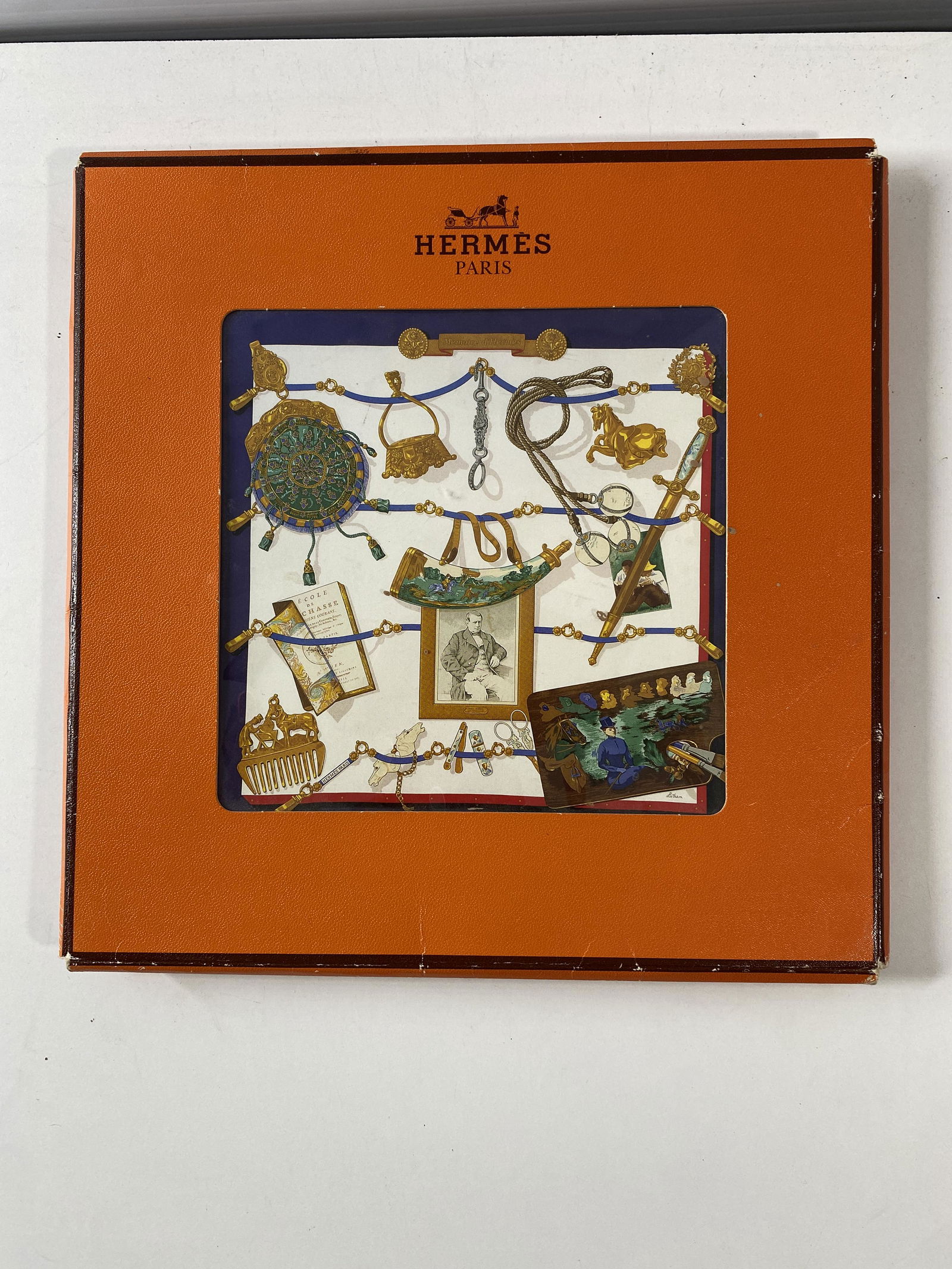 Vintage Classic Authentic Hermes Paris Memoire D'Hermes Silk Scarf: Classic HermÃ¨s silk scarf featuring blue and multicolor 'Memoire d'Hermes' house signatures motif, finished with hand-rolled edges. 100% Silk. Artist Caty Latham. 35.4” L x 35.4” W (Cla
