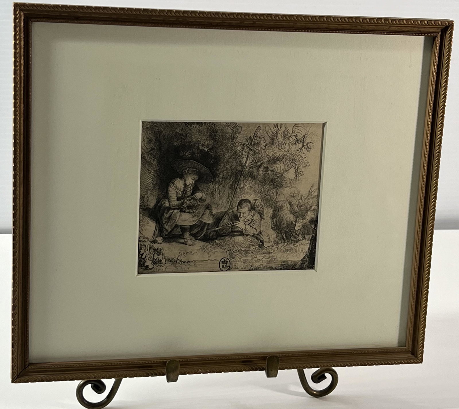 The Flute Player,, Rembrandt (Rembrandt van Rijn) (Dutch, Leiden 1606 - 1669 Amsterdam): Rembrandt, The flute player etching of a women and a man down by a river with there sheep not to far behind, the women is sitting at the edge making something out of flowers and branches, while the ma