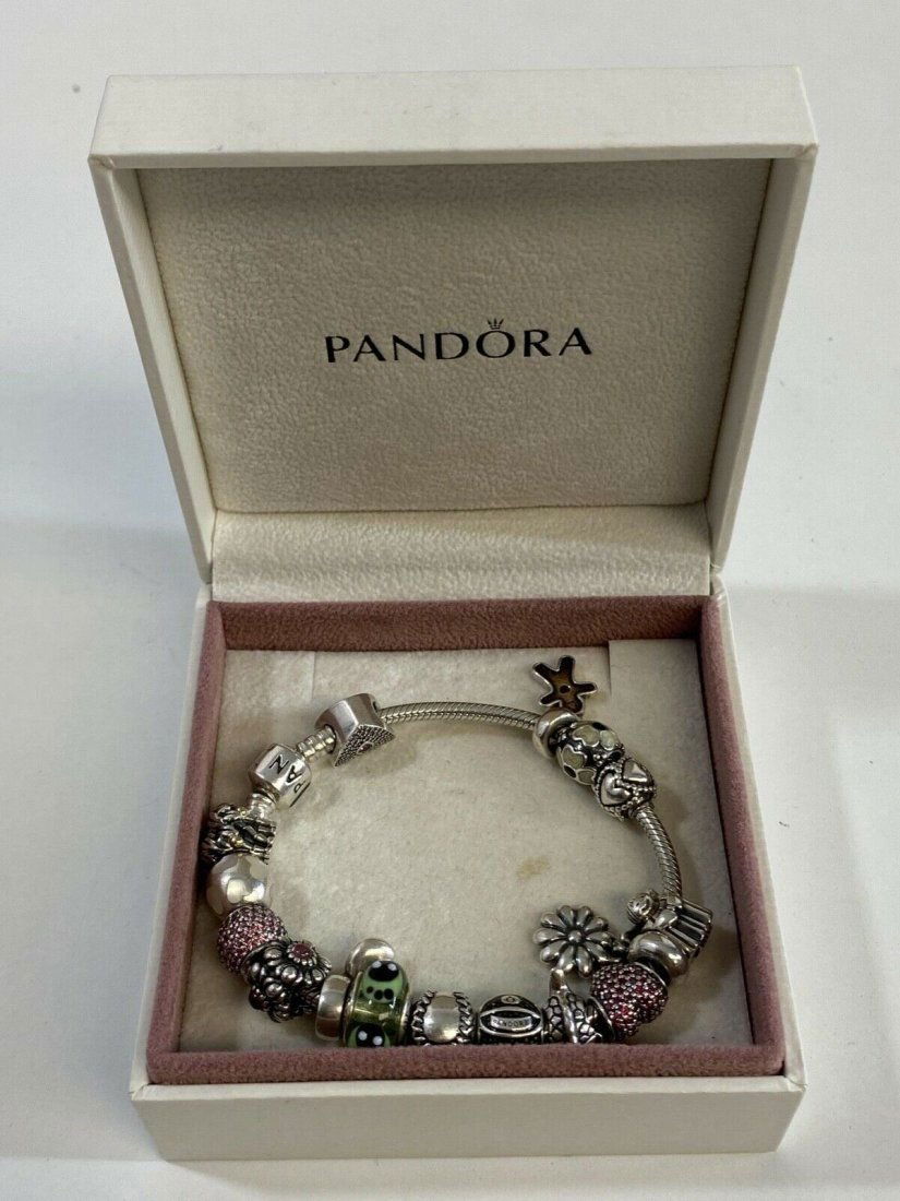 Pandora Sterling Silver Bracelet with 16 Sterling charms (1 of 9)