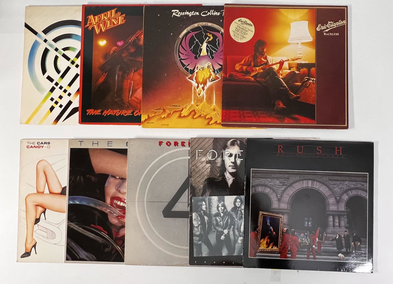 Rush, Foreigner, The Cars, Eric Clapton, Collins Band, April Wine, & ATF Vinyl Albums - Lot of 9: Moving Pictures - RUSH 1981: Side 1: Serial No. SRM-1-4013-AS-PW1 Side 2: Serial No. SRM-1-4013-BS-PW2, Foreigner - Double Vision 1978: Side 1: Serial No. ST-A-784097-PR Side 2: Serial No. ST-A-784098