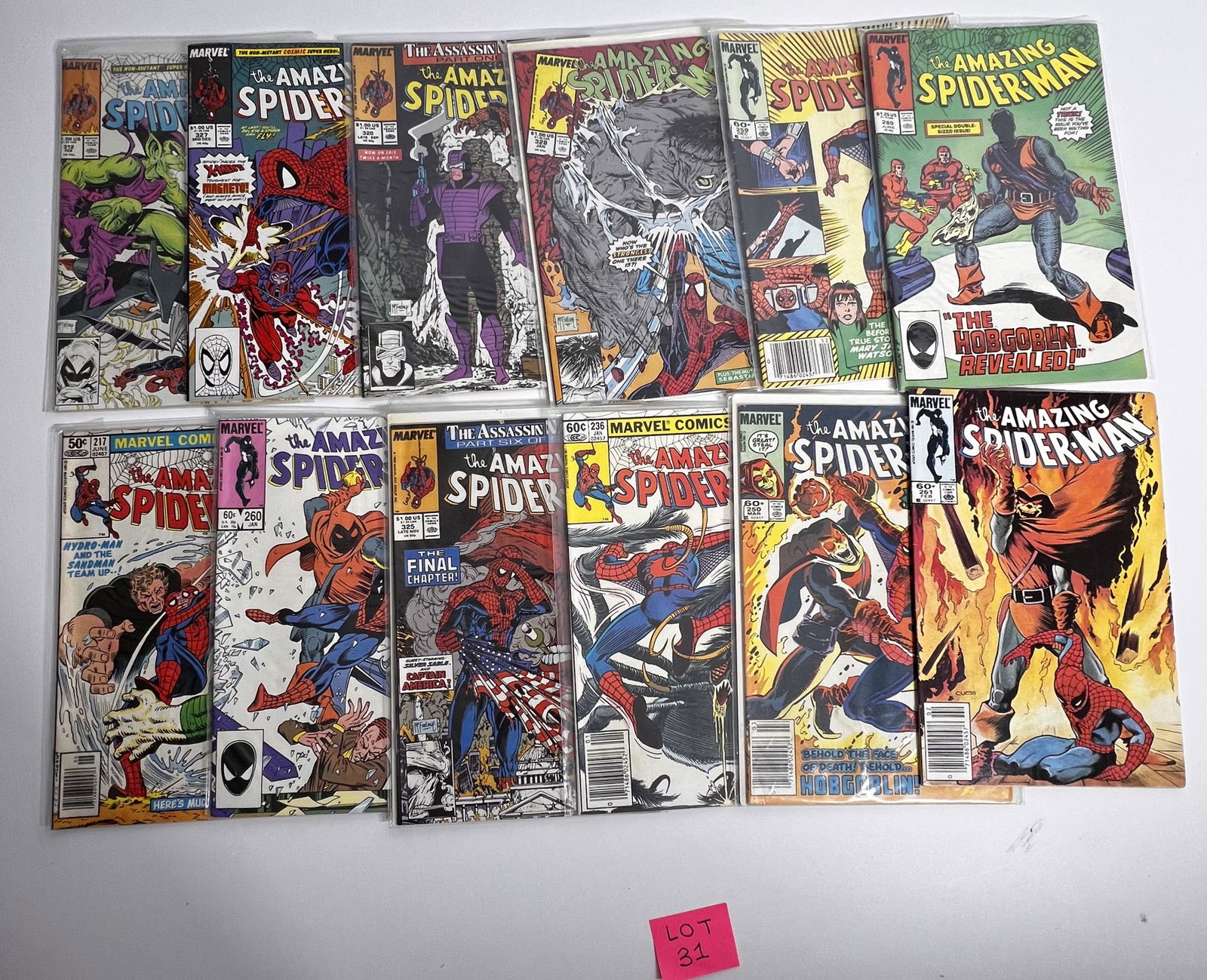 (12) Marvel Comic Books The Amazing Spider-man No. 217, No. 236, No. 250, No. 259, No. 260, No. 261, (1 of 3)