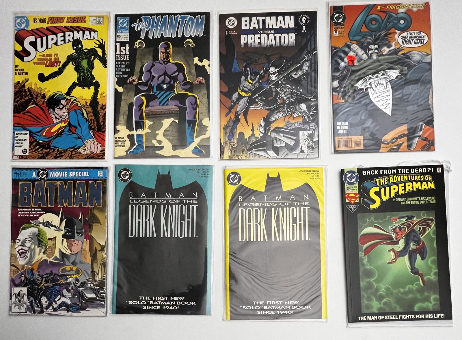 (8) D.C. Comic Books - Batman No. 1 , Superman No. 1 , The Phantom No. 1 , Batman vs Predator No. 1 (1 of 5)