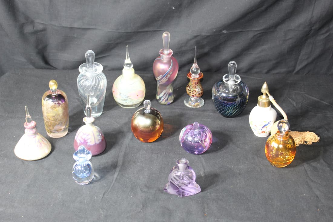 Lot of 14 Glass Prefume Bottles: Lot of 14 Glass Prefume Bottles. 1 Aynsley Est 1775 Made in England Fine English Bone China. With a Gold Atomiser. The bottle has a very nice picture on it of flowers and a blue bird. It measures 5 in