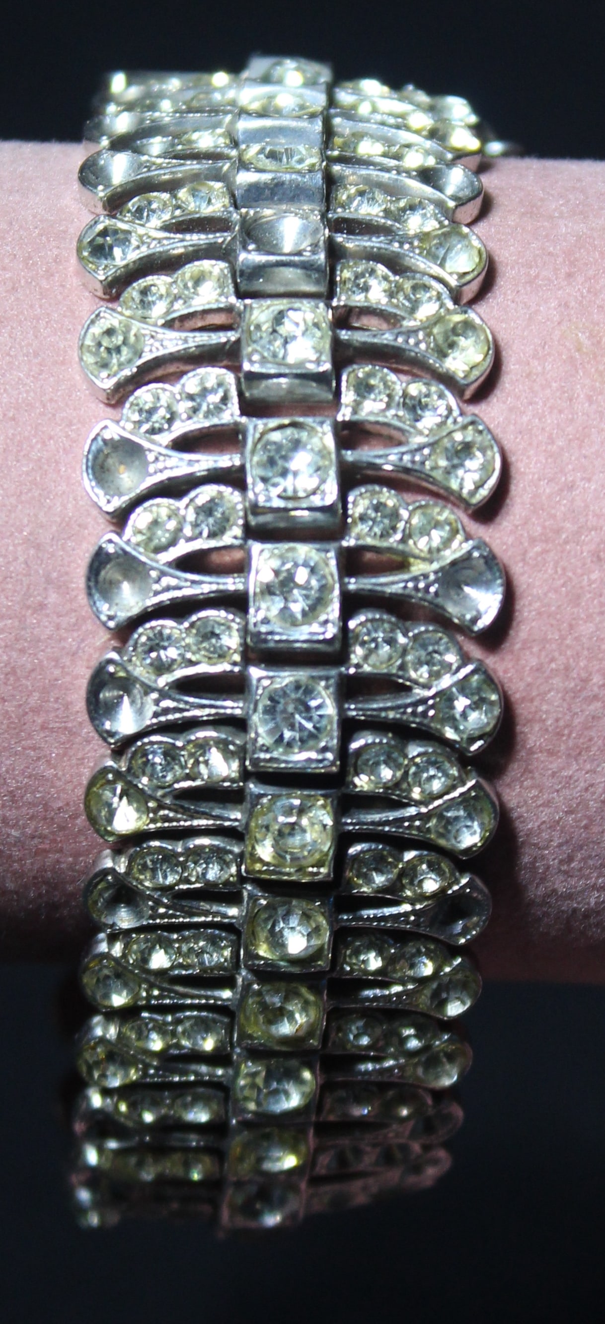Sterling Silver Bracelet 47 grams: This is a beautiful dazling Sterling Silver Bracelet with Clear Stones. It is a great accessory that will add a touch of sparkle to your wrist. THe bracelet is made from sterling silver and adorned wi