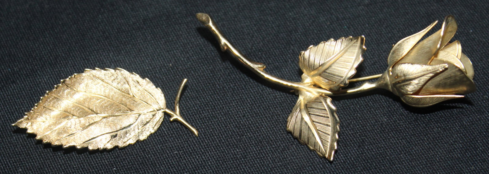 Christan Dior Leaf & Giovanni Rose Brooch: This is a beautiful Christan Dior Leaf Brooch. It was intricaley design to captivate a single leaf. It adds a touch of natural elegance to any outfit, it measures 1 1/4" x 1". The Giovanni Rose Brooch