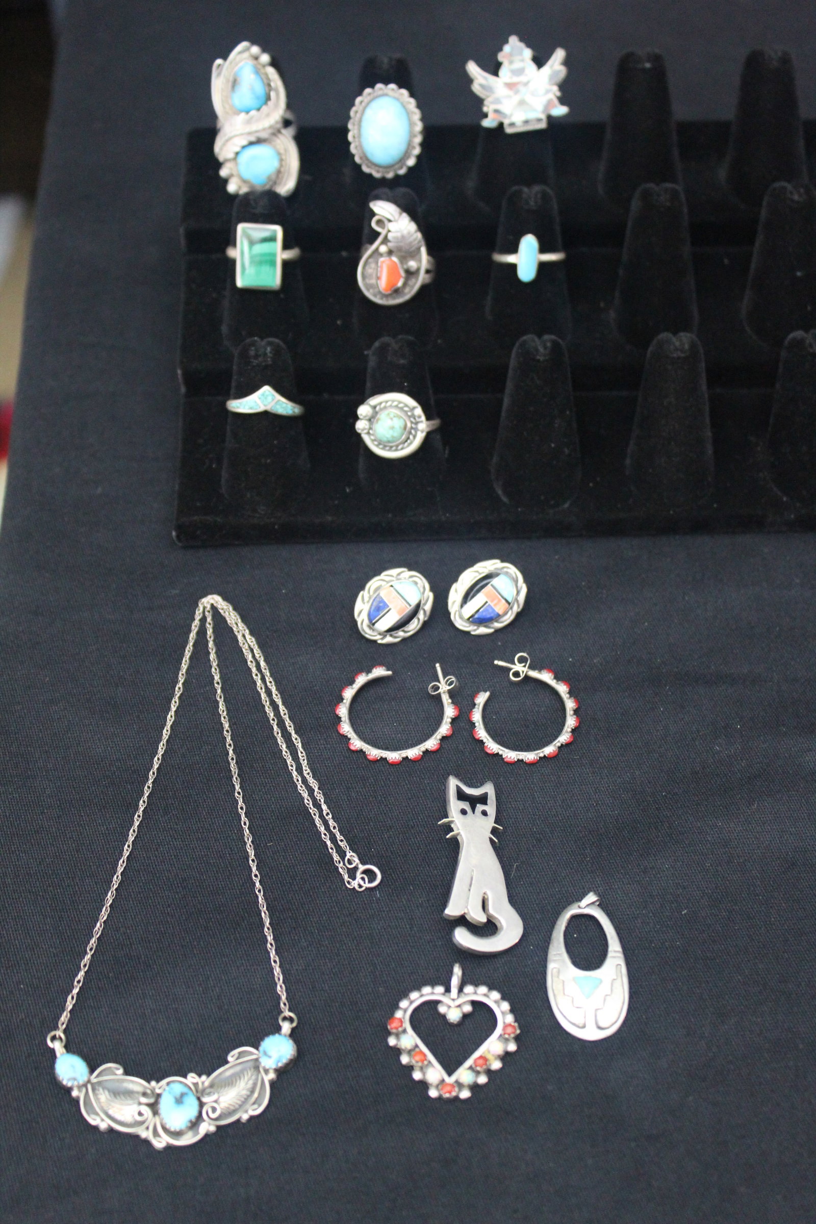 Lot of Navajo Sterling Sivler Jewlery - Pendants, Earrings, Rings & Necklaces 53 grams: Lot of Navajo Sterling Sivler Jewlery - Pendants, Earrings, Rings & Necklaces. Most of the navajo jewlery is not stamped, but has been tested. These pieces of jewelry showcase an intricate design. Ver