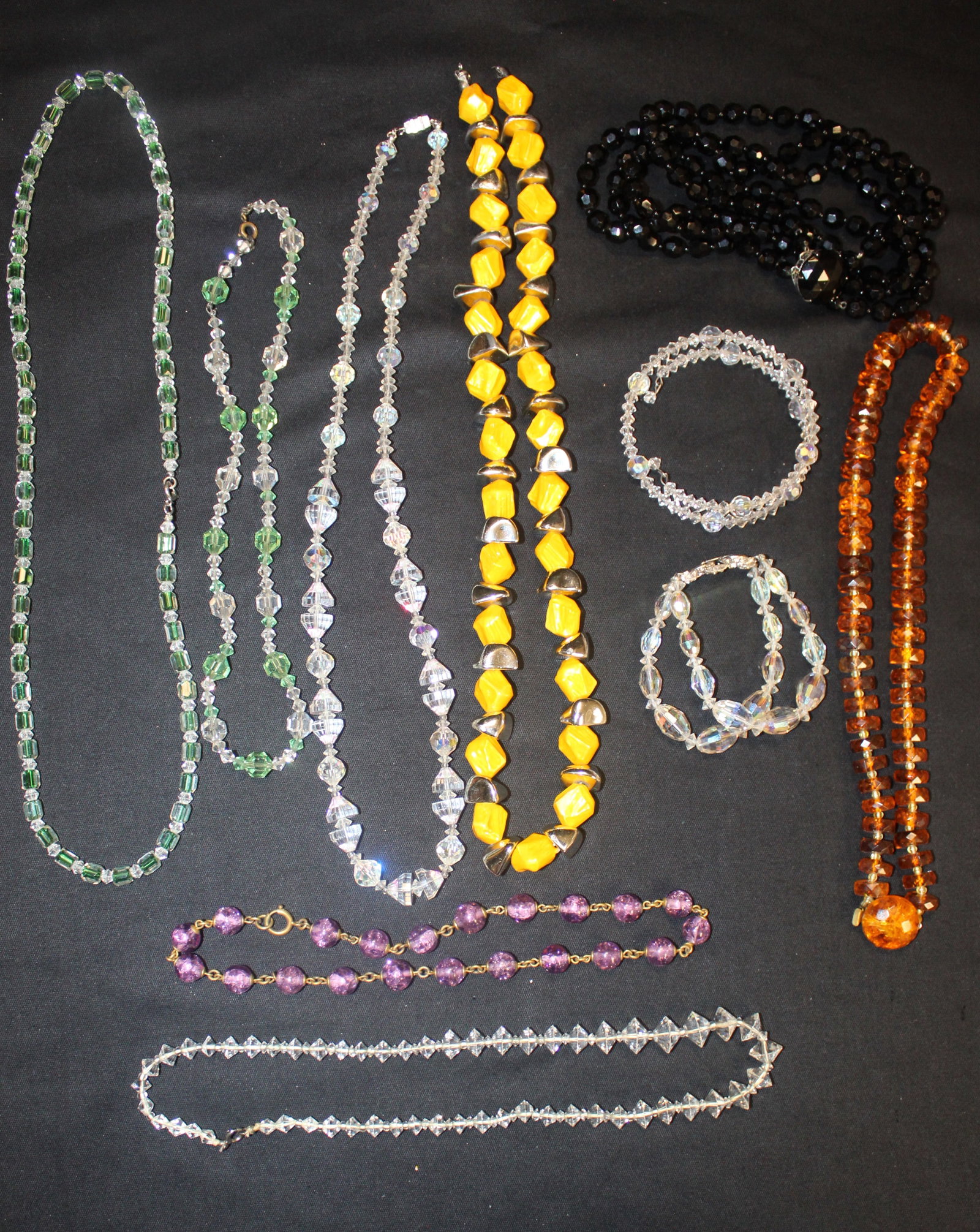 (10) Pairs of Costume Jewelry Necklaces & Bracelets: (10) Pairs of Costume Jewelry Necklaces & Bracelet. This is a beautiful lot of jewelry that will be perfect for any special occasion. They're all various sizes and colors and all have different style 