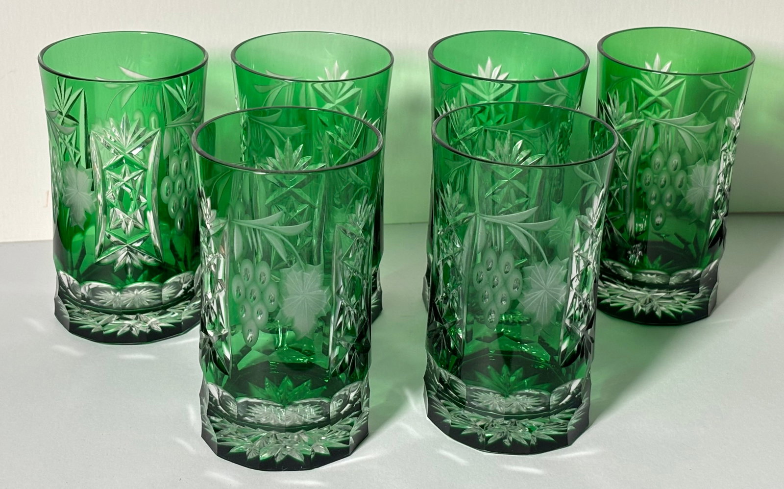 (6) Green Eteched Glass Cups: (6) Green Eteched Glass Cups. These are beautiful glass cups, they are in great condition for their age. They measure 2 5/8" x 4 3/4"