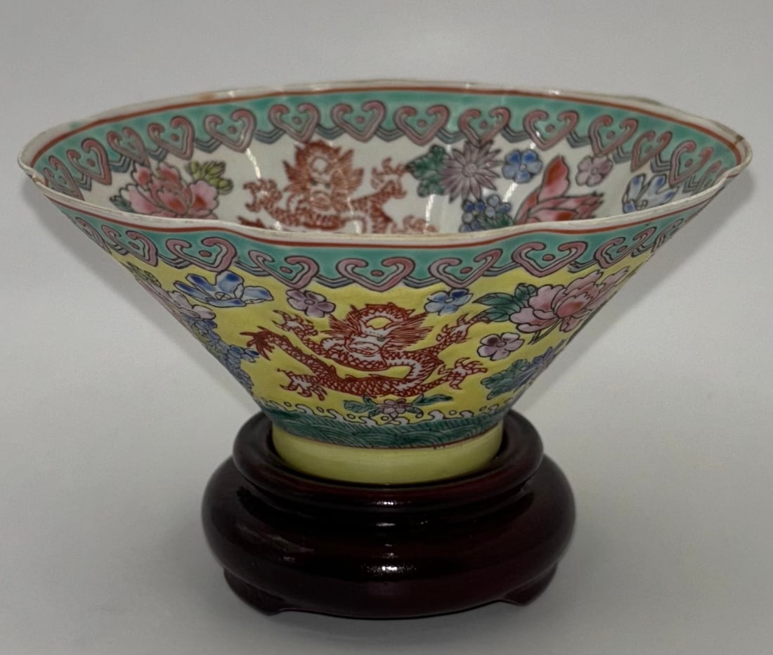 Chinese Eggshell Porcelain Bowl on Wooden Stand: Chinese Eggshell Porcelain Bowl on Wooden Stand. This is a beautiful piece of decor, it is in good condition for its age, it has a beauttiful floral dragon deisign. it measures 2" x 5" x 1 1/2" Base.
