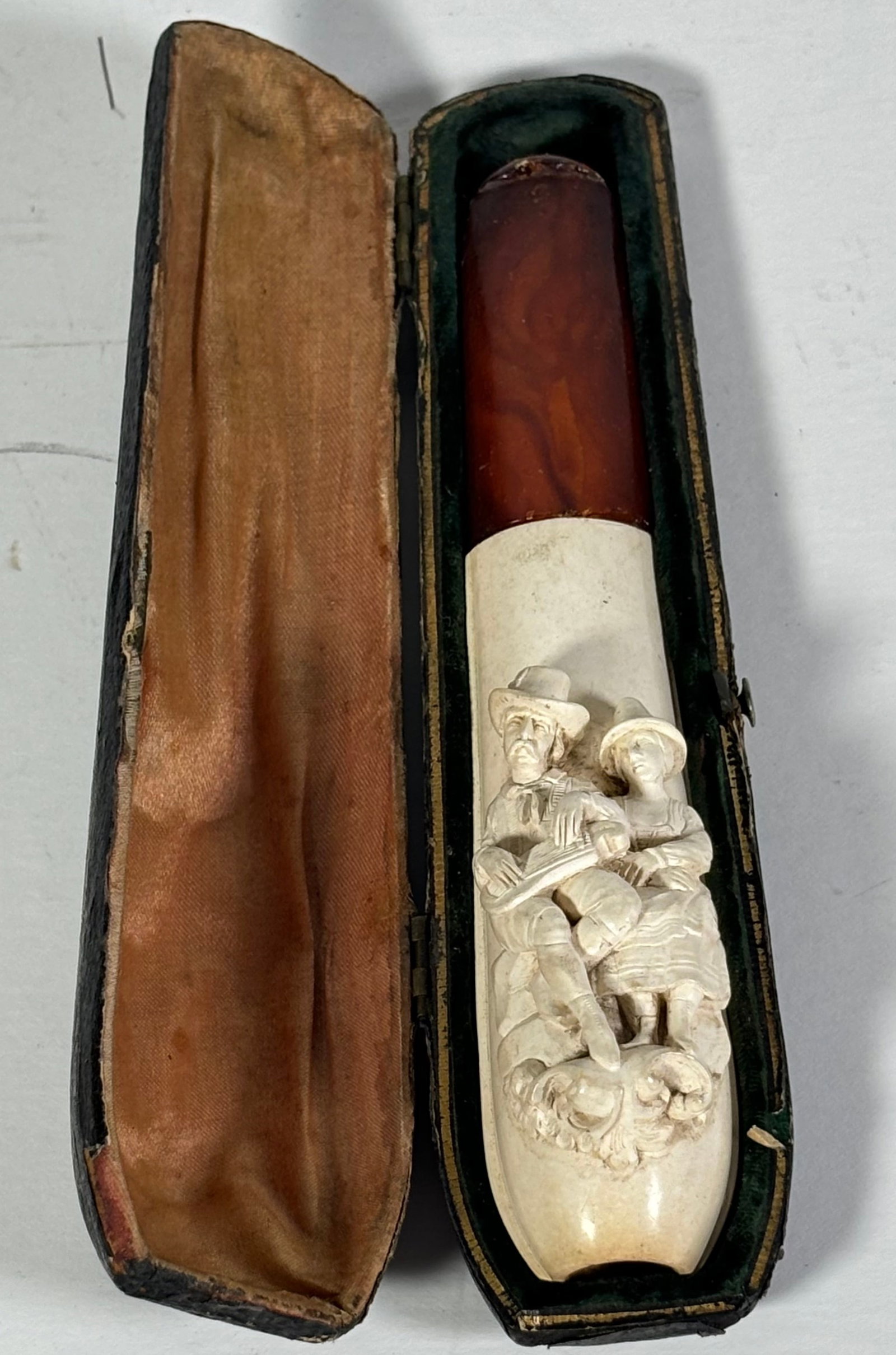 Antique Meerschaum and Amber Figural Cigar Holder w/ Original Case: Antique Late 1800s Meerschaum and Amber Figural Cigar Holder w/ Original Case. This is a cool old cigar holder. It is in great condition for its age. This is a very unqiue piece. it has a figural of a