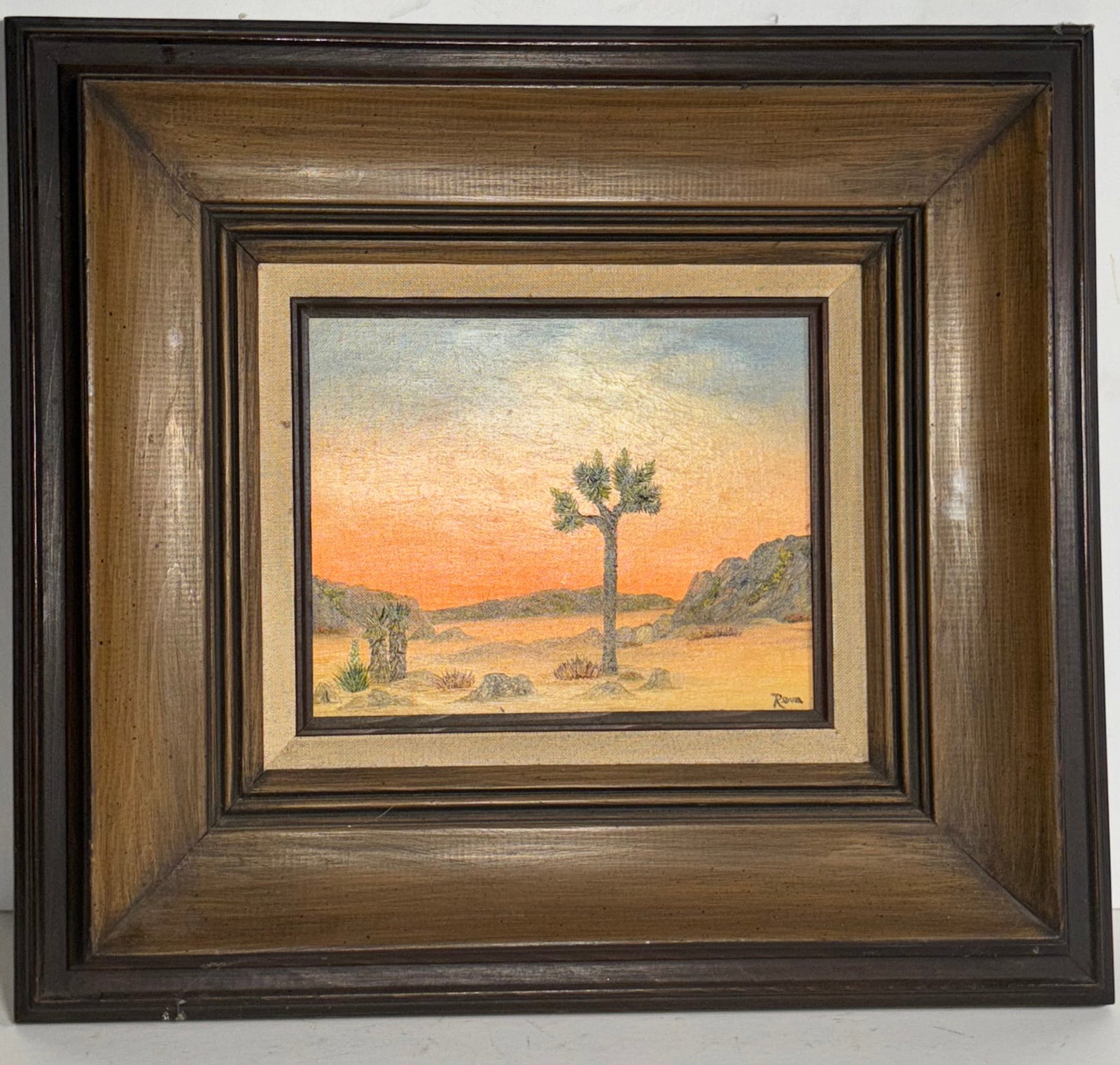 Oil on Canvas Landscape Painting Signed by Reva: Oil on Canvas Landscape Painting Signed by Reva. This is a beautiful painting, it is in great condition, the artist used vibrant colors to create a beautiful desert landscape. The artist uses oranges 