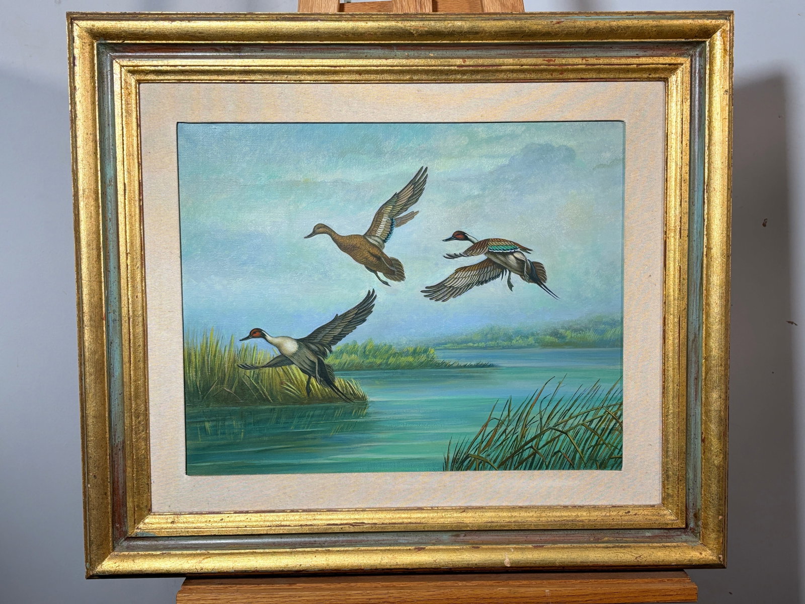Ducks in Flight Painting Oil on Canvas by Adolfo Tagliaferri: Ducks in Flight Painting Oil on Canvas by Adolfo Tagliaferri. This is a beautiful painting, the artist caotures the dynamic beauty of a group of ducks in mid flgiht. The painting was produced by a ski